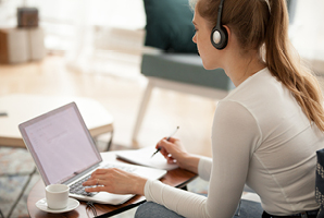 Student taking online course on laptop