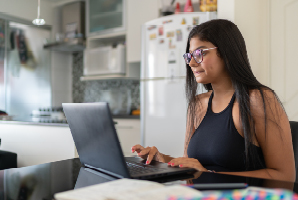 Student Studying on Laptop for Online Degree