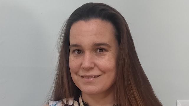 headshot of student who became educator