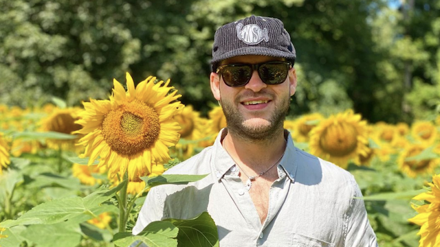 rutgers student in flower field