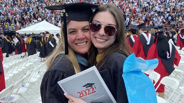 mother daughter hugging at graduation